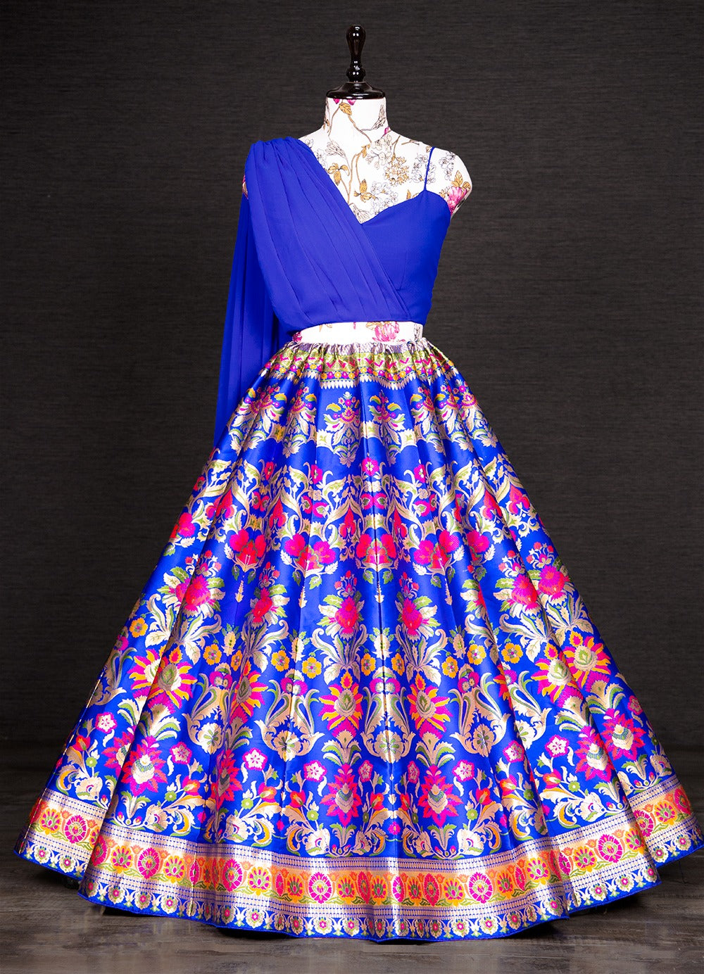 Step into with our best lehenga weaved perfectly and beautifully crafted with Banarasi design detailing. This look is perfect of all your shaadi season styles be it sangeet, pooja, kitty parties or brunches.