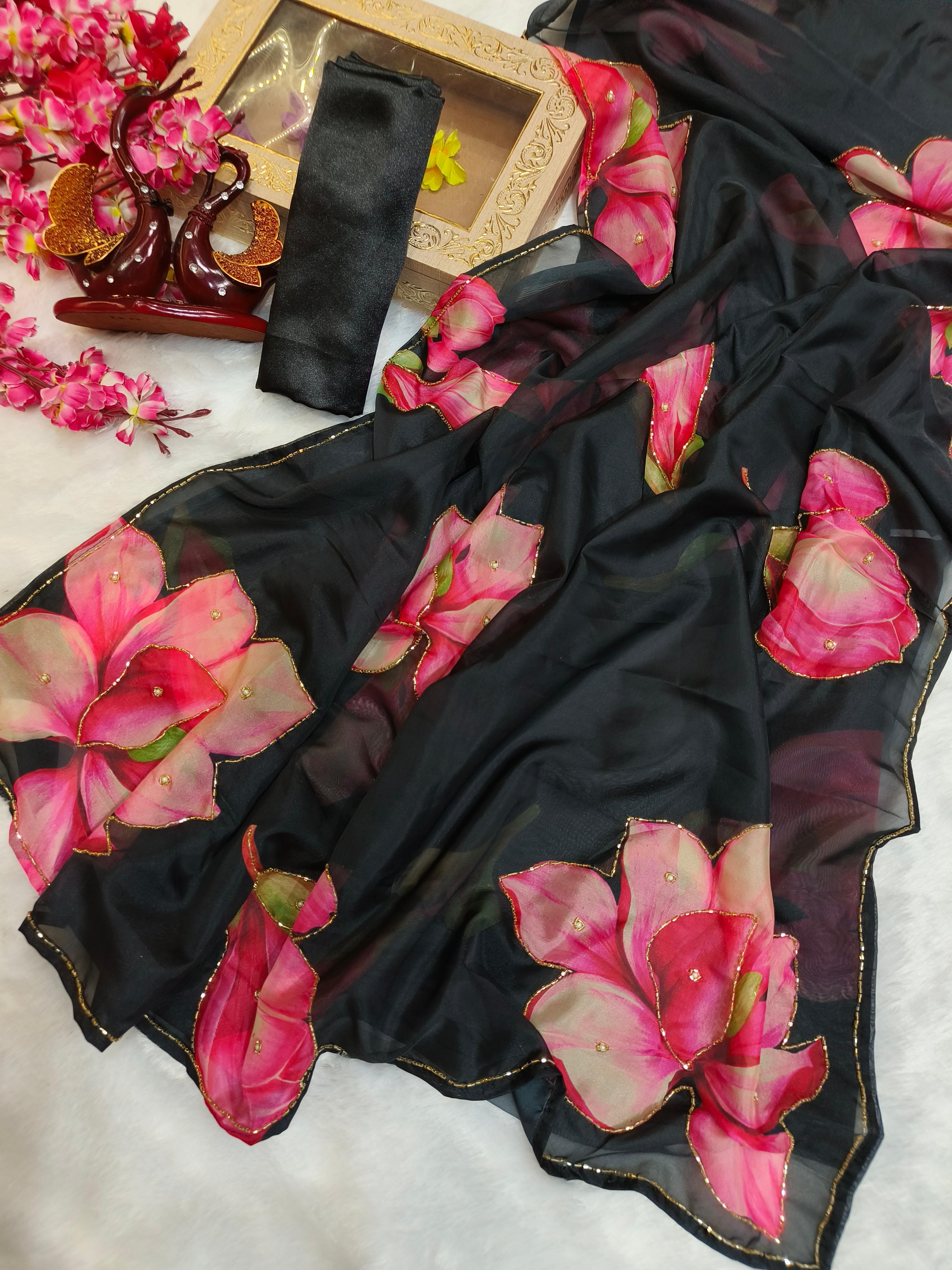 printed organza saree blends classic beauty with modern elegance. Each delicate petal in the design tells a story of timeless charm, making it the perfect choice for those who appreciate both tradition and contemporary style.*