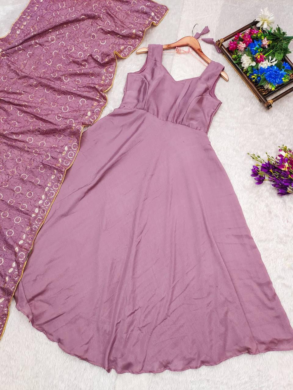 Turn Heads At Weddings And Parties With Our Exquisite Mauve Chinnon Silk Anarkali Suit Set.